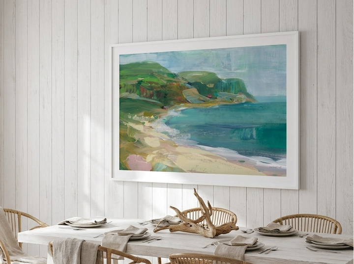 Modern wall art print styled on the wall in a coastal dining room