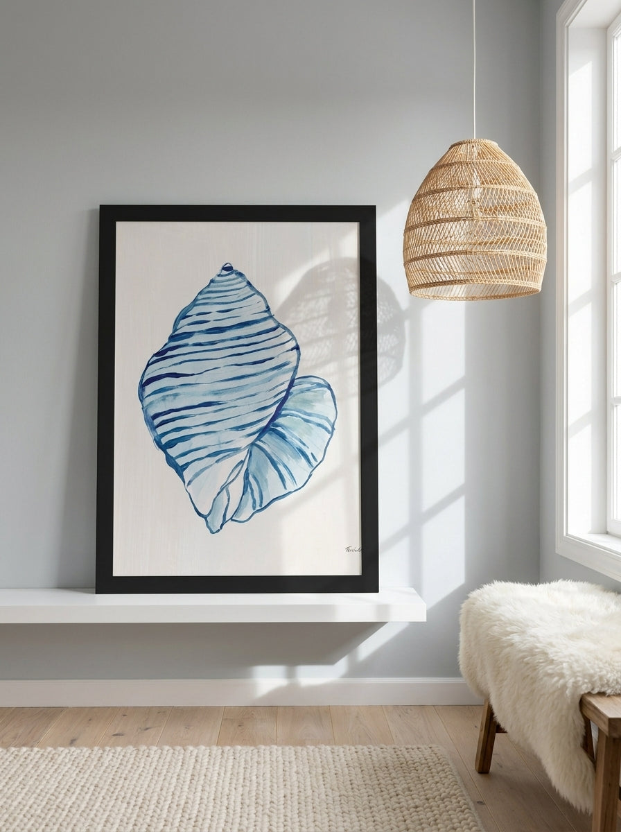 Modern wall art print standing on a shelf in a bright Scandinavian bathroom