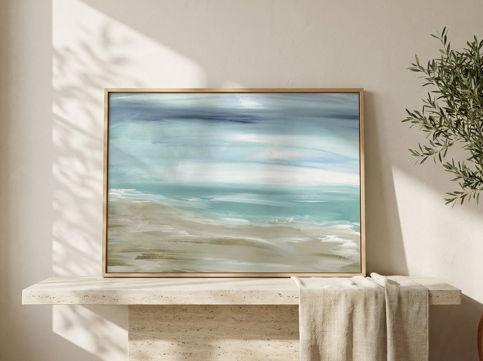 Modern wall art print standing on a console in a Mediterranean bathroom