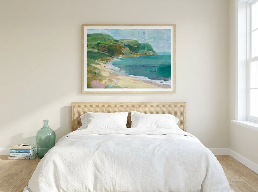 Modern wall art print styled on the wall in a coastal bedroom
