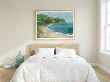 Modern wall art print styled on the wall in a coastal bedroom