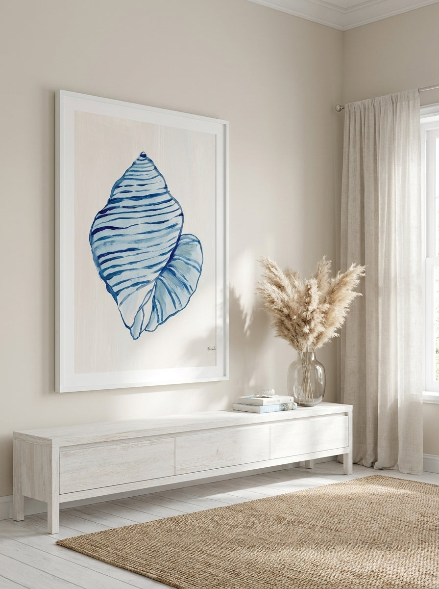 Oversized statement modern wall art print styled on the wall in a coastal living room