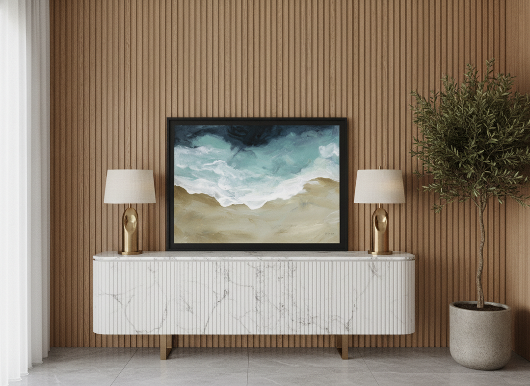 Modern wall art print standing on a sideboard in a luxe home office