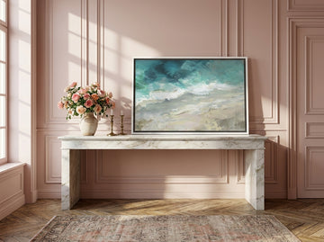 Canvas wall art with a white surround standing on a console in a Parisian bathroom