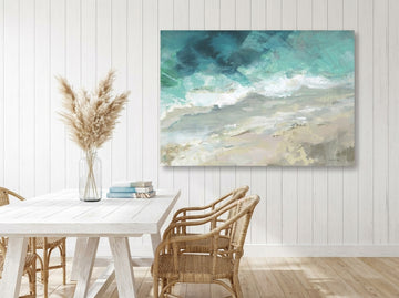 Stretched canvas wall art styled on the wall in a coastal dining room