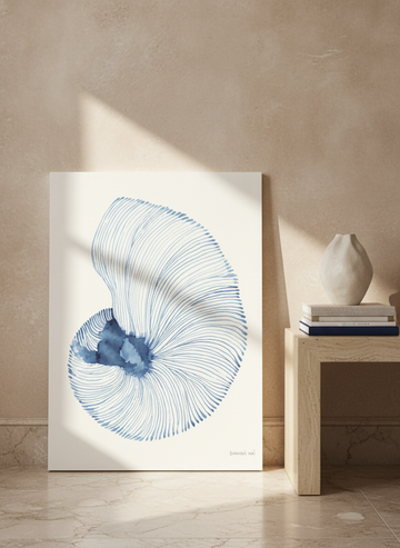 Stretched canvas wall art leaning against the wall in a luxe bedroom