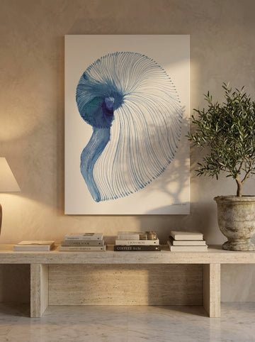 Stretched canvas wall art styled on the wall in a luxe living room