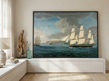 Modern wall art print standing on a console in a coastal home office