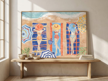 Canvas wall art with a natural timber surround standing on a bench in a warm Japandi bedroom