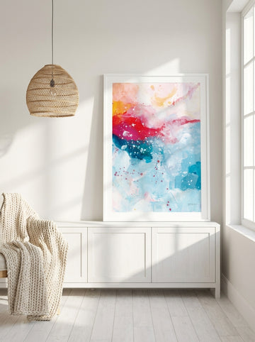 Modern wall art print standing on a sideboard in a bright Scandinavian home office