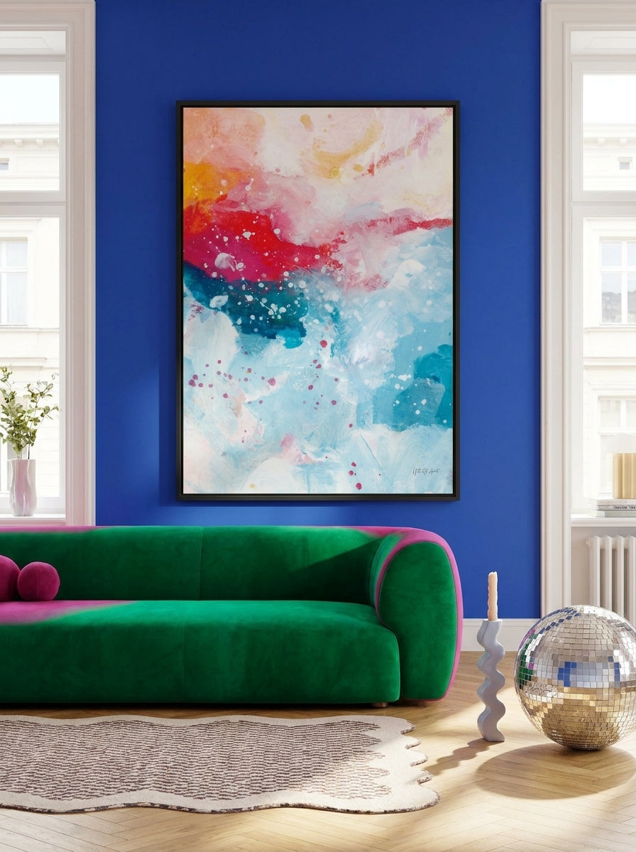 Oversized statement canvas wall art with a white surround styled on the wall in a colourful eclectic living room
