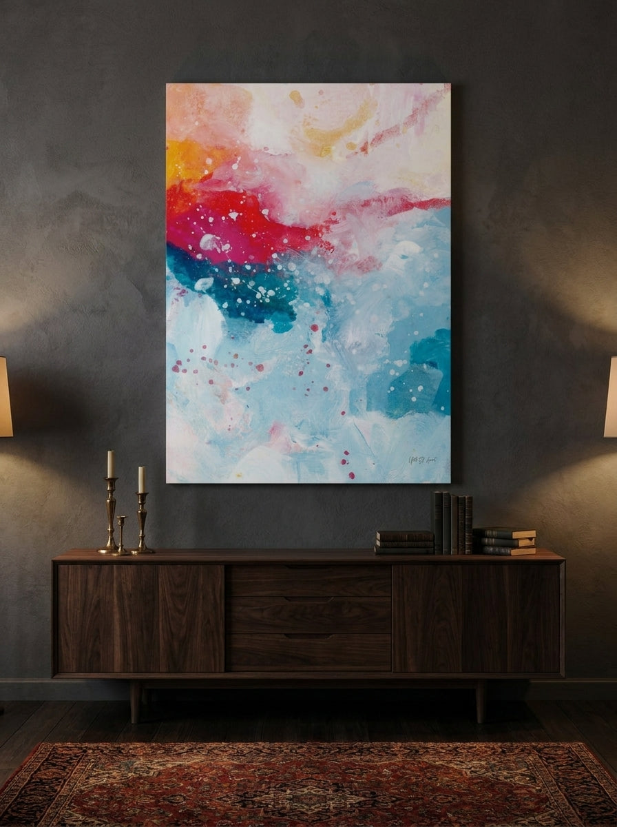 Stretched canvas wall art styled on the wall in a moody living room