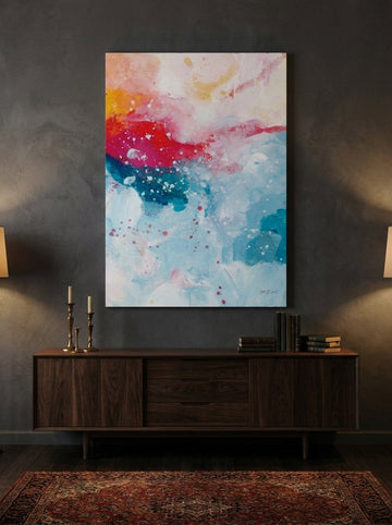 Stretched canvas wall art styled on the wall in a moody living room