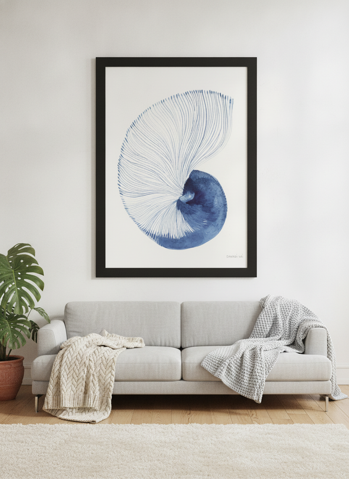 Oversized statement modern wall art print styled on the wall in a bright Scandinavian living room