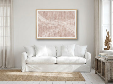 Modern wall art print styled on the wall in a coastal living room