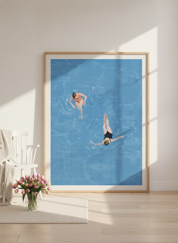 Oversized statement modern wall art print leaning against the wall in a bright Scandinavian bedroom