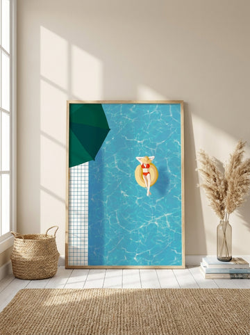 Oversized statement modern wall art print leaning against the wall in a coastal living room