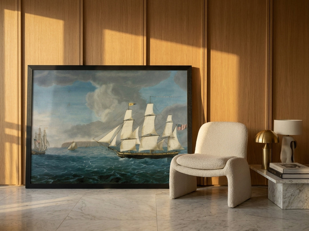 Oversized statement modern wall art print leaning against the wall in a luxe dining room