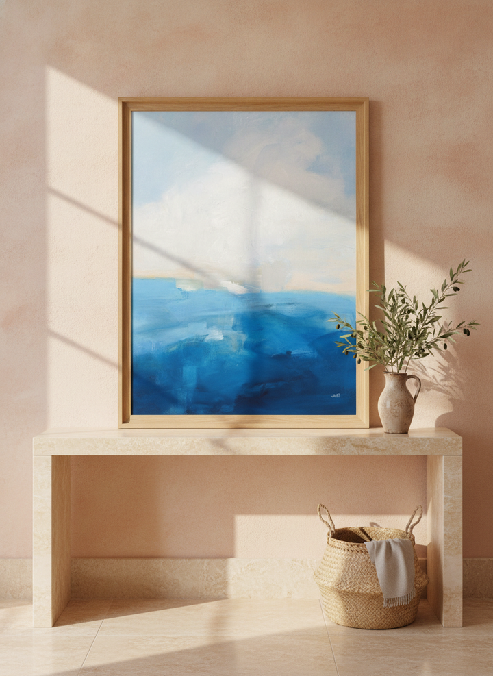Modern wall art print standing on a console in a Mediterranean home office