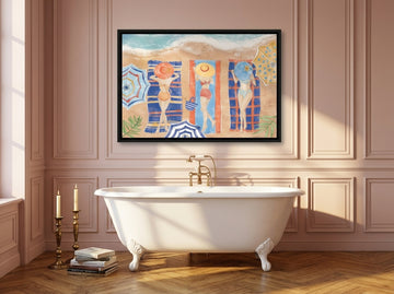 Canvas wall art with a black surround styled on the wall in a Parisian bathroom