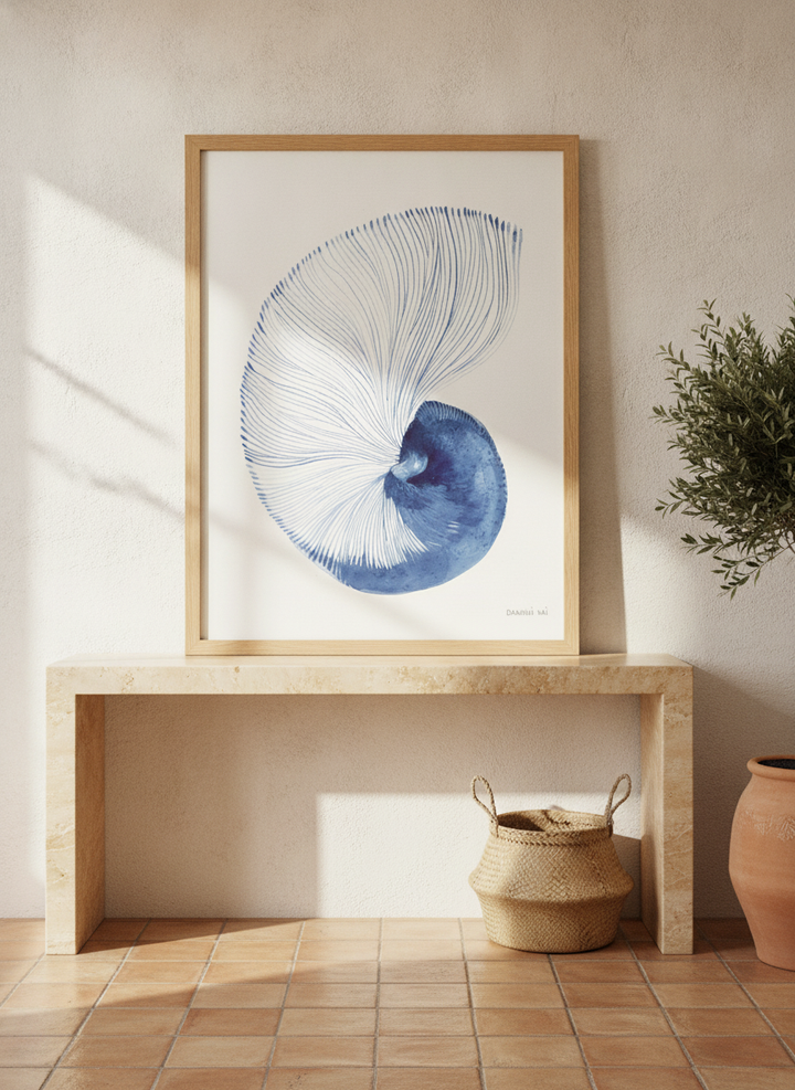 Modern wall art print standing on a console in a Mediterranean bathroom