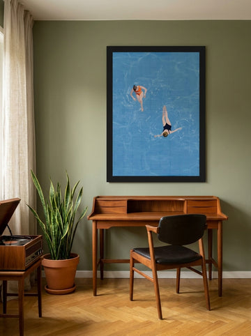 Modern wall art print styled on the wall in a mid-century home office