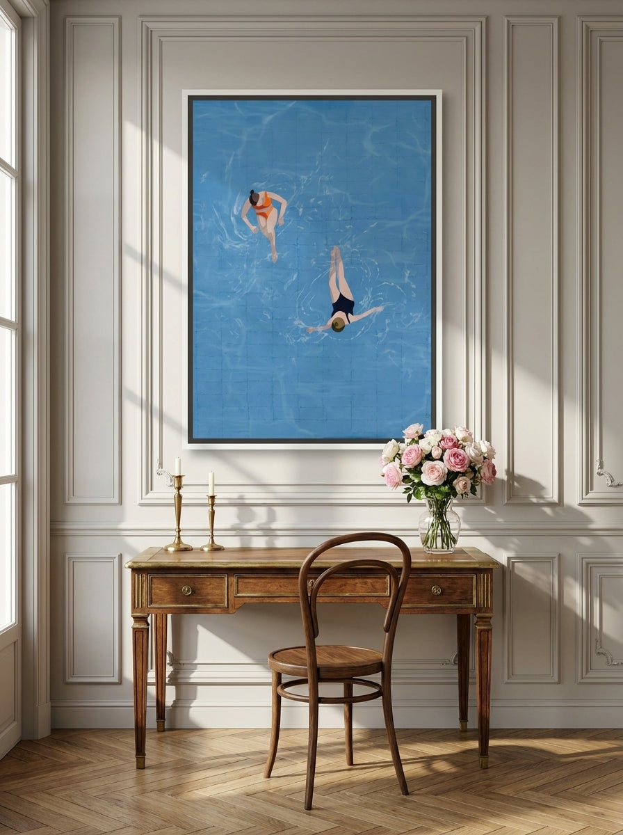 Canvas wall art with a white surround styled on the wall in a Parisian home office