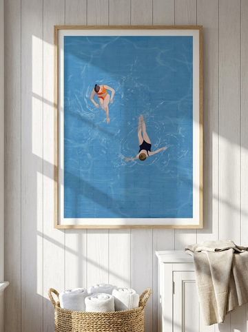 Modern wall art print styled on the wall in a coastal bathroom