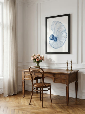 Modern wall art print styled on the wall in a Parisian home office