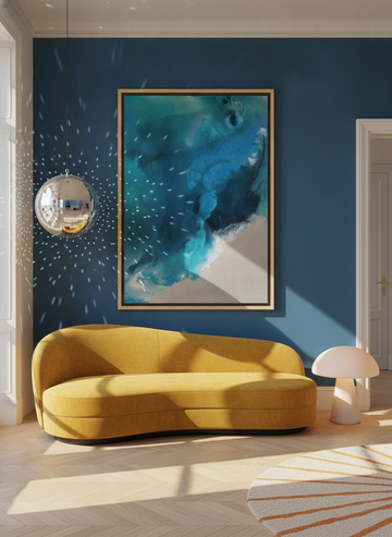 Oversized statement canvas wall art with a natural timber surround styled on the wall in a colourful eclectic living room