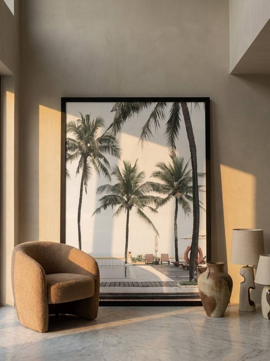 Oversized statement modern wall art print leaning against the wall in a luxe dining room