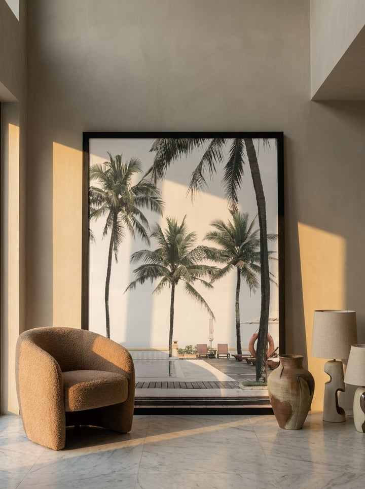 Oversized statement modern wall art print leaning against the wall in a luxe dining room