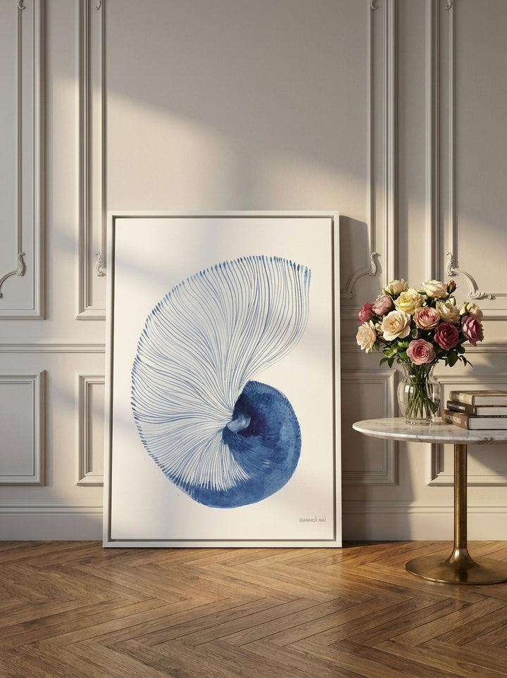 Canvas wall art with a white surround leaning against the wall in a Parisian bathroom