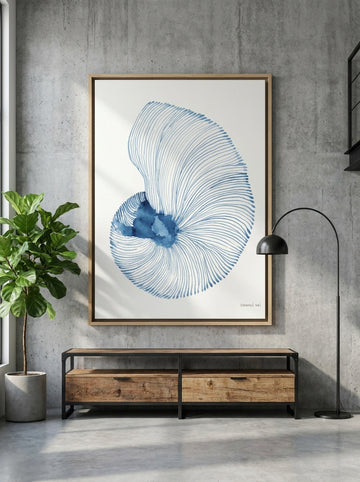 Oversized statement canvas wall art with a natural timber surround styled on the wall in an industrial loft living room