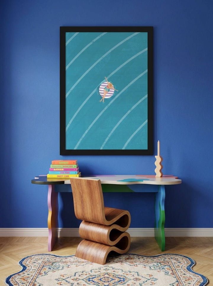 Modern wall art print styled on the wall in a colourful eclectic home office