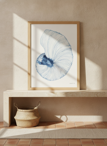 Modern wall art print standing on a console in a Mediterranean bathroom