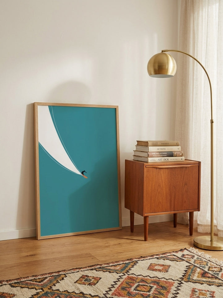 Modern wall art print leaning against the wall in a mid-century bedroom