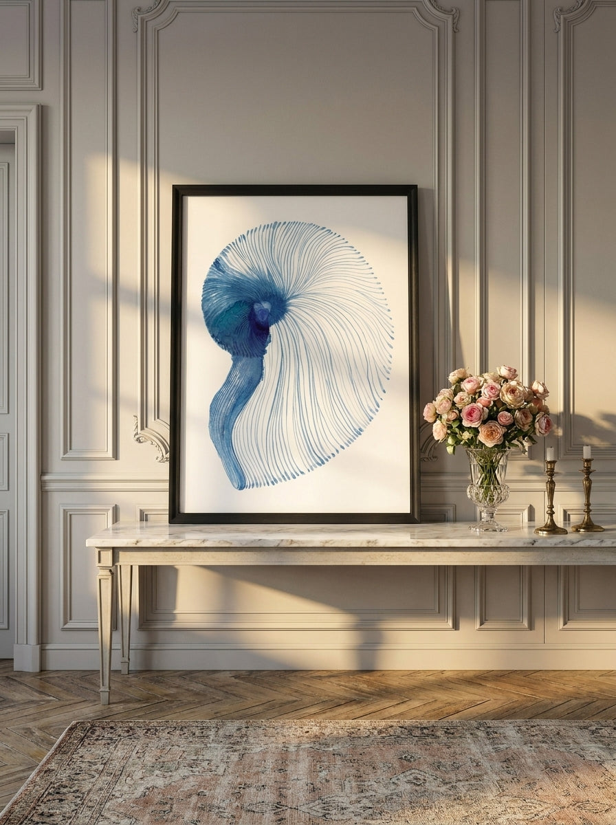 Modern wall art print standing on a console in a Parisian home office