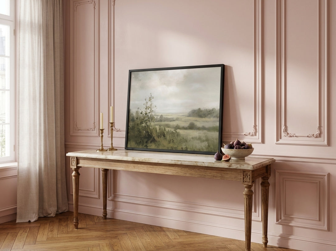 Modern wall art print standing on a console in a Parisian living room