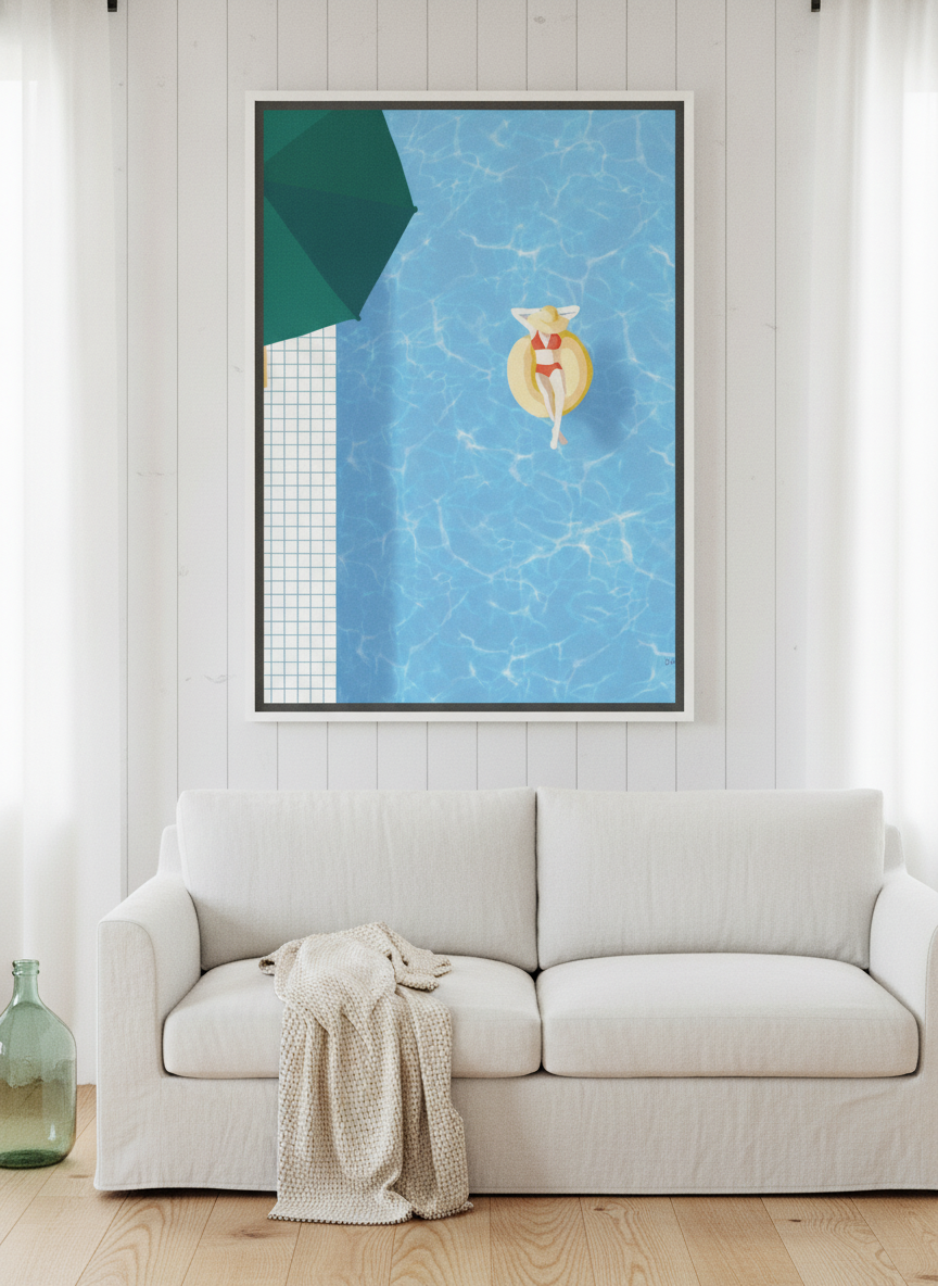 Oversized statement canvas wall art with a white surround styled on the wall in a coastal living room