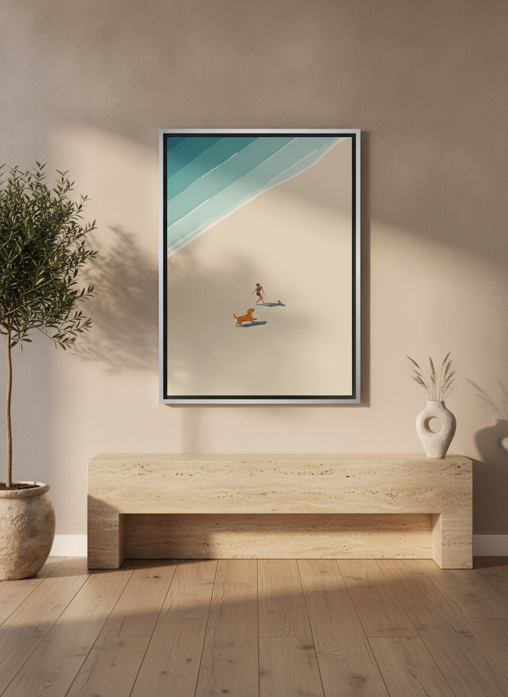 Canvas wall art with a silver leaf surround styled on the wall in a luxe living room