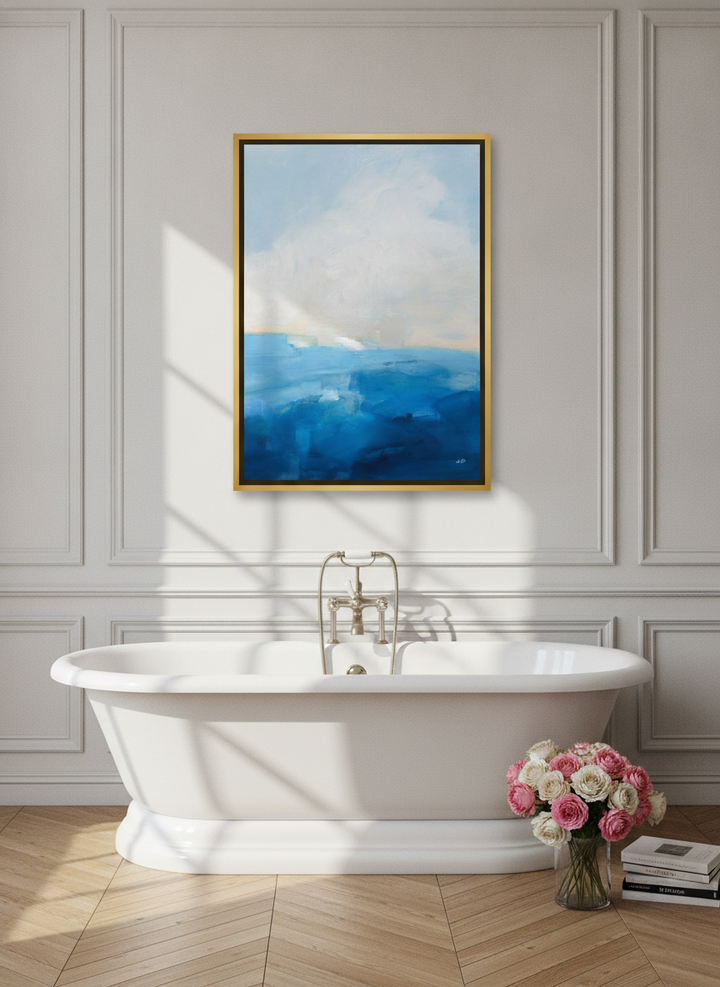 Canvas wall art with a gold leaf surround styled on the wall in a Parisian bathroom