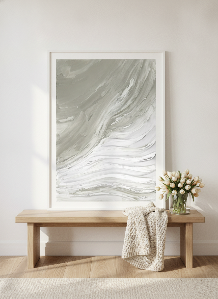 Modern wall art print standing on a bench in a bright Scandinavian home office