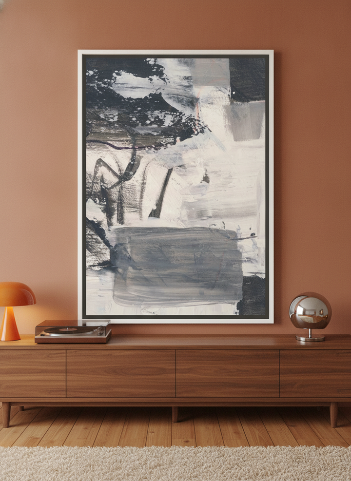 Canvas wall art with a white surround standing on a sideboard in a retro 70s home office