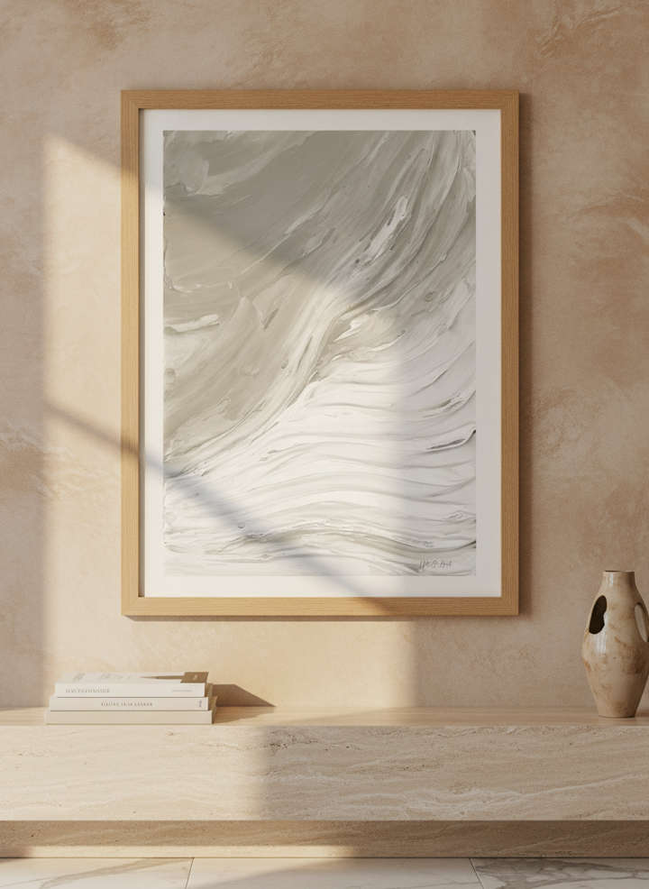 Modern wall art print styled on the wall in a luxe living room