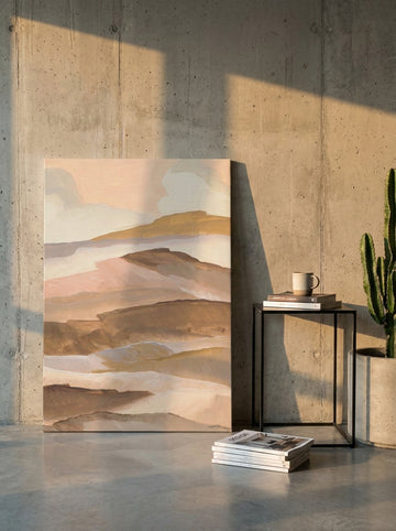 Stretched canvas wall art leaning against the wall in an industrial loft home office