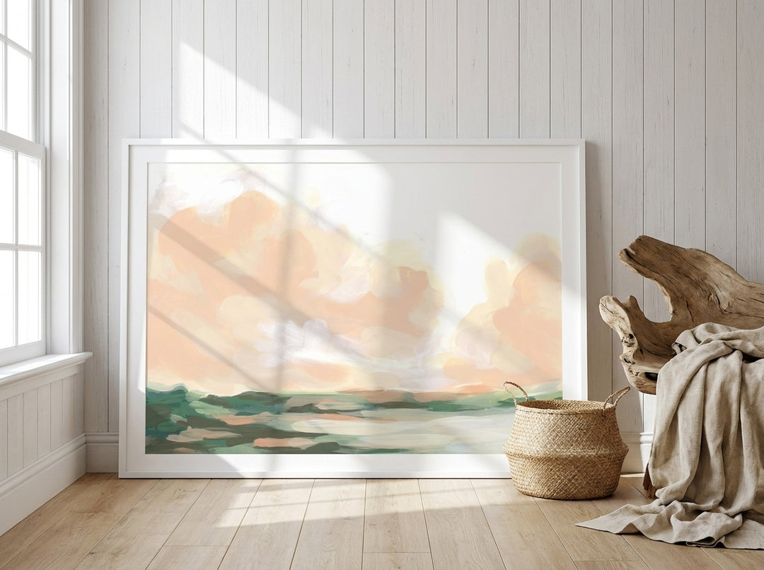 Oversized statement modern wall art print leaning against the wall in a coastal bedroom