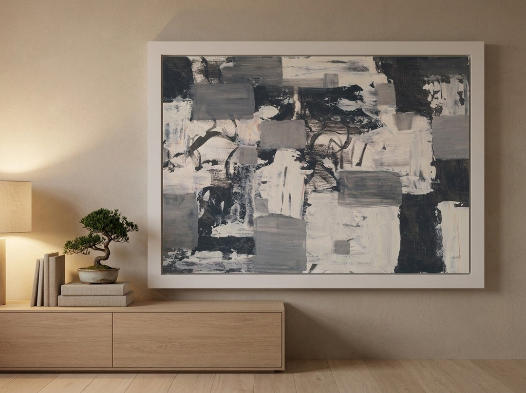 Modern wall art print styled on the wall in a warm Japandi living room