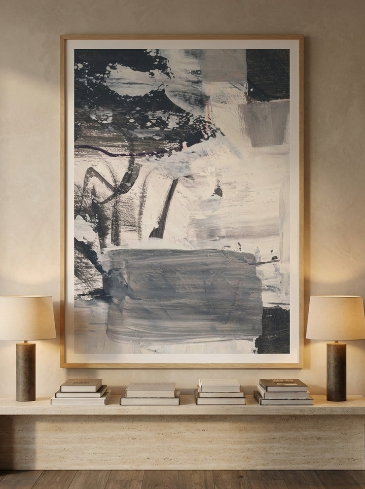 Modern wall art print styled on the wall in a luxe living room