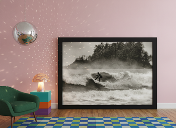 Oversized statement modern wall art print leaning against the wall in a colourful eclectic living room